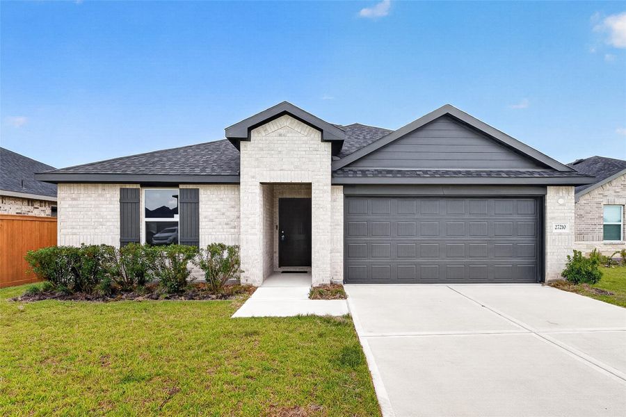 Front exterior of a new home in , Katy, TX, highlighting curb appeal (Image 1). Front exterior of a new home in , Katy, TX, highlighting curb appeal (Image 1).