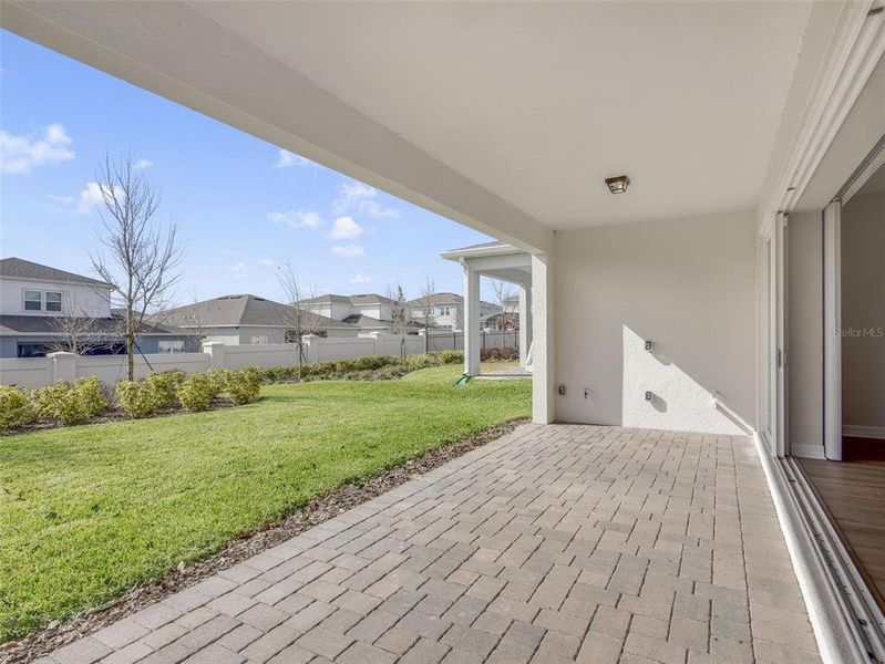 Exterior details and patio area of a home in Willow Ridge, Montverde (Image 34).