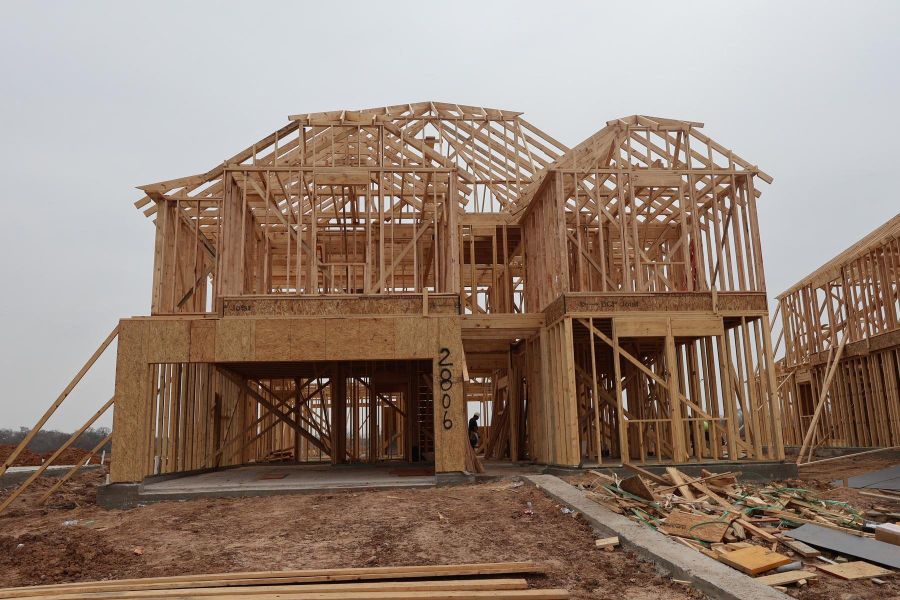 Two story home with 5 beds, 4.5 baths, and 3 car tandem garage