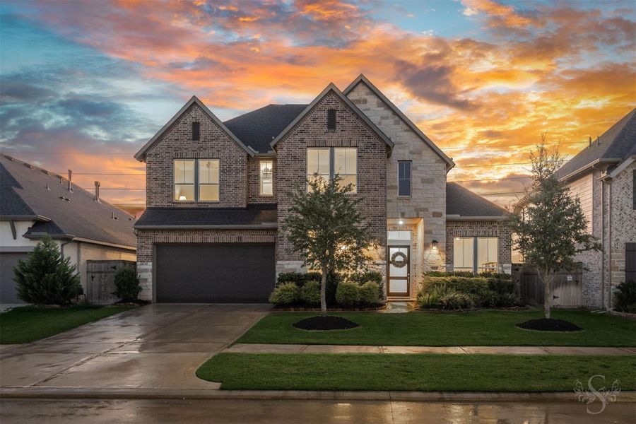 This exceptional 4 bedroom, 3.5 bath, 3 car garage home in Cross Creek Ranch showcases striking brick and stone architecture with impressive curb appeal. A modern front door and manicured landscaping beautifully complete the exterior. This exceptional 4 bedroom, 3.5 bath, 3 car garage home in Cross Creek Ranch showcases striking brick and stone architecture with impressive curb appeal. A modern front door and manicured landscaping beautifully complete the exterior.