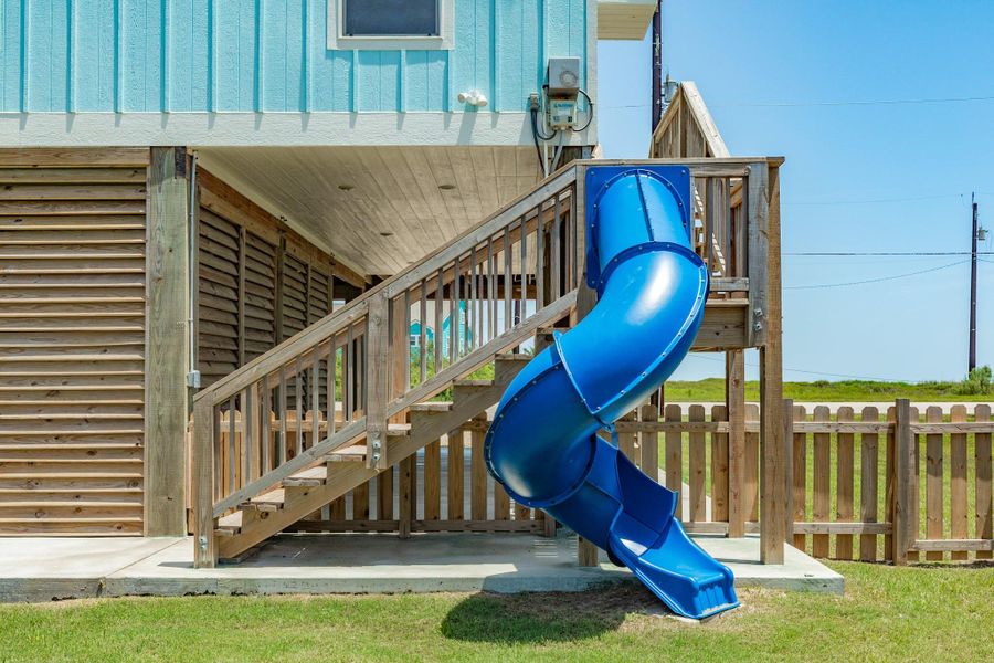 Spiral slide offers a unique and playful way to access the backyard, adding extra enjoyment for family and guests.