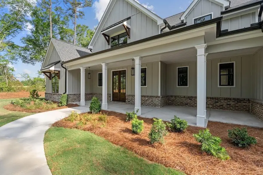 Exterior details and patio area of a home in , Carrollton (Image 3).