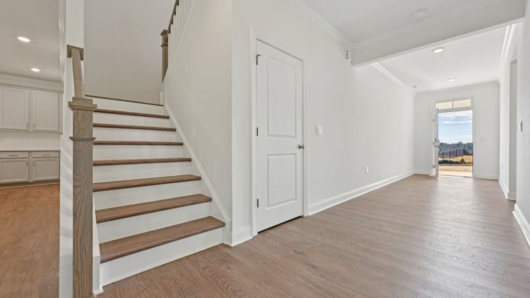 Representative unfurnished interior of a home built from the Wylie by D.R. Horton in Eagle Creek, Fuquay Varina (Image 13).