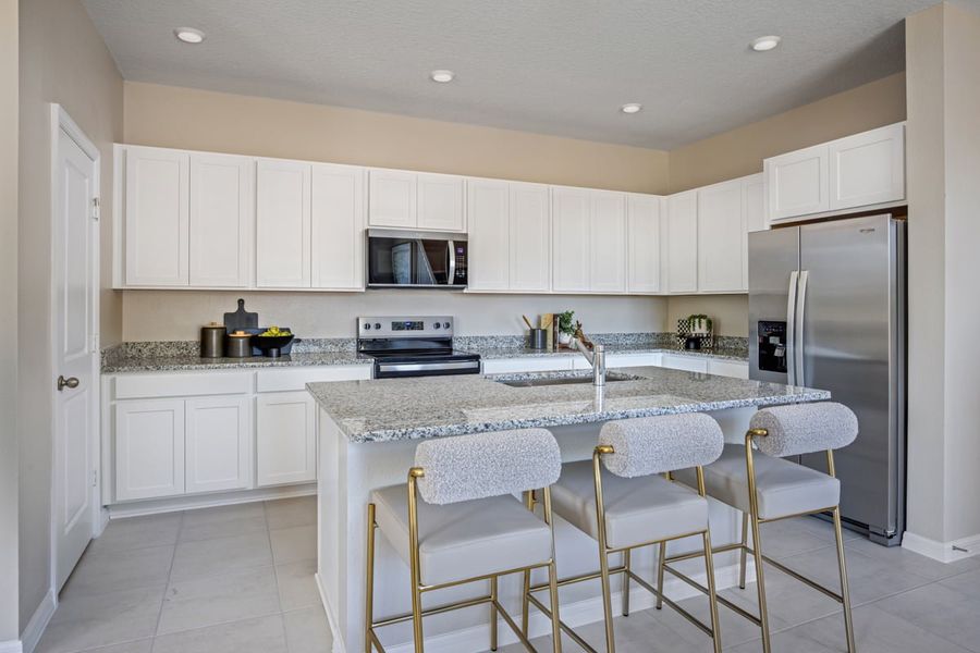 Representative furnished interior of a home built from the 1852 Modeled by KB Home in The Shores I, St. Cloud (Image 6).