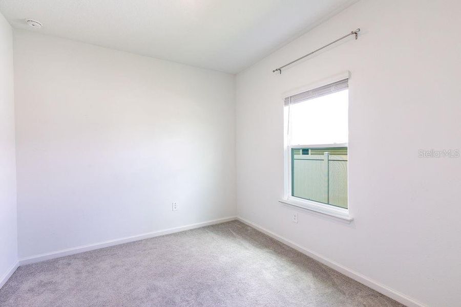 Spacious, unfurnished interior of a new home in Trailhead Landing, Alachua (Image 22).