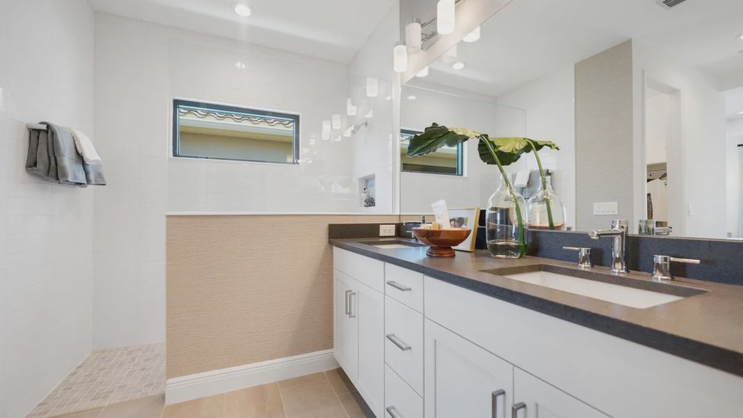 Representative furnished interior of a home built from the Meadow Brook by Neal Communities in SkySail, Naples (Image 7).