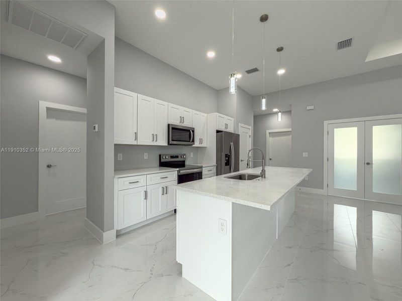 Furnished interior view inside a new home in , Lehigh Acres (Image 6). Furnished interior view inside a new home in , Lehigh Acres (Image 6).