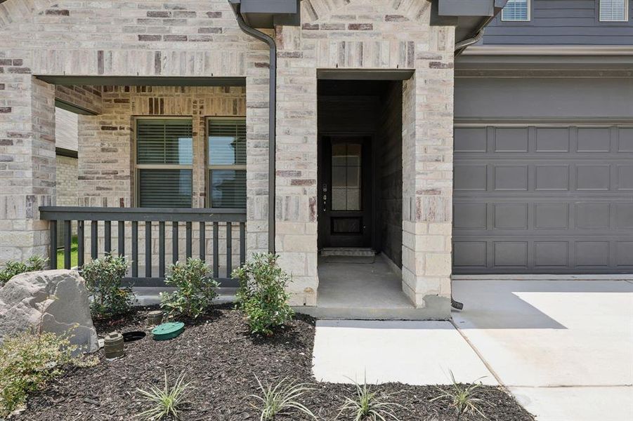 Front exterior of a new home in Westmoor, Sherman, TX, highlighting curb appeal (Image 22).