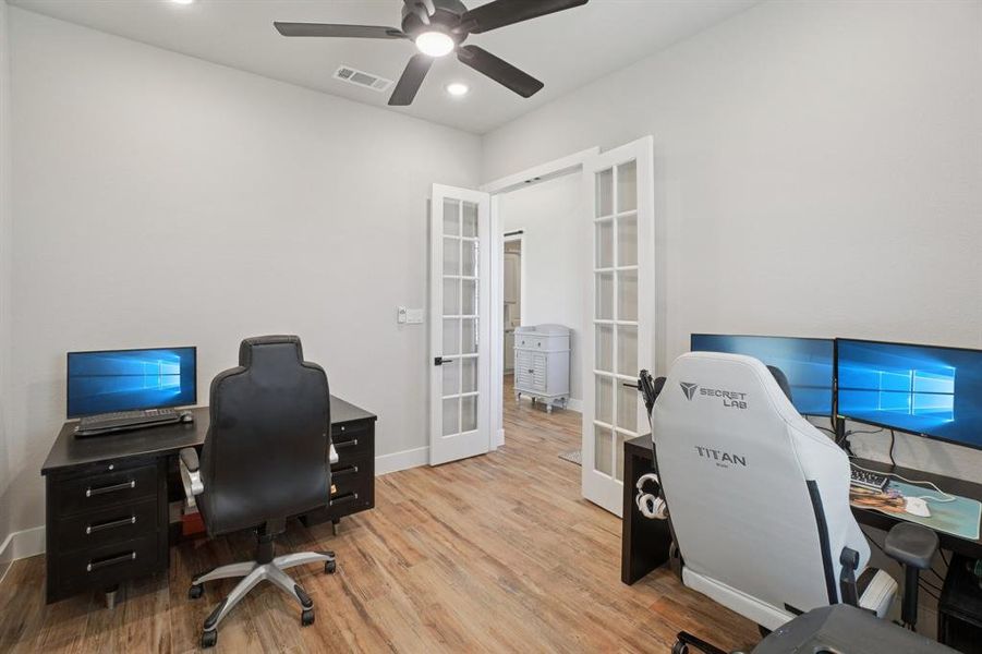 Office featuring french doors, wood finished floors, recessed lighting, and a ceiling fan
