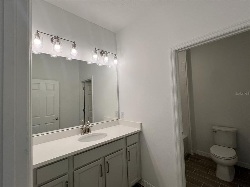 Furnished interior view inside a new home in Trinity Gardens, Deland (Image 4).