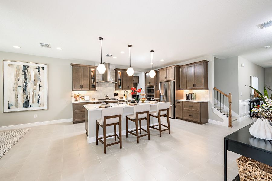 Representative furnished interior of a home built from the Pelican by Homes by WestBay in Crosswind Ranch, Parrish (Image 27).