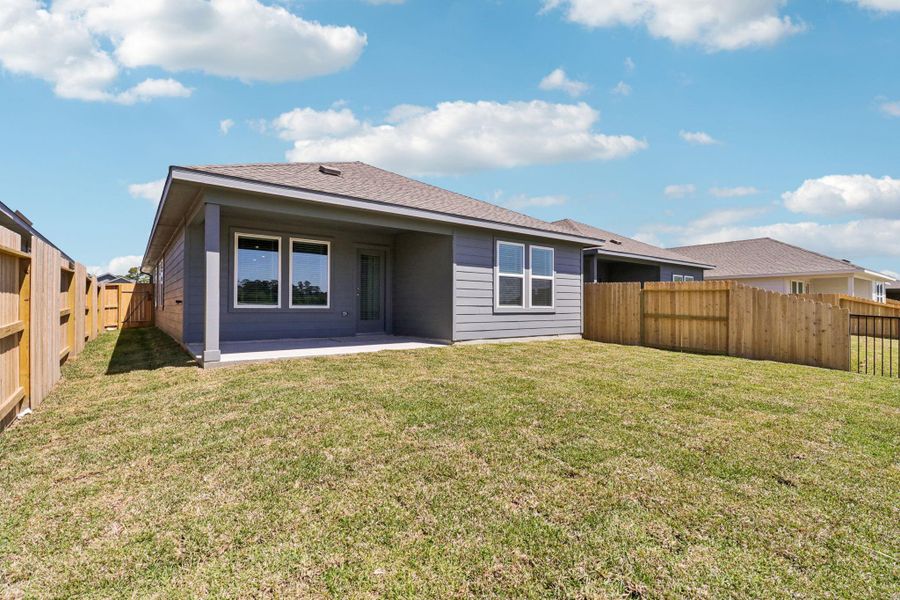 Exterior details and patio area of a home in , Conroe (Image 20). Exterior details and patio area of a home in , Conroe (Image 20).