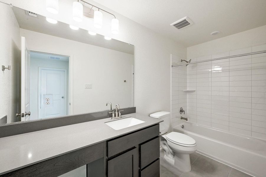 Furnished interior view inside a new home in Salerno - Classic Collection, Round Rock (Image 8). Furnished interior view inside a new home in Salerno - Classic Collection, Round Rock (Image 8).