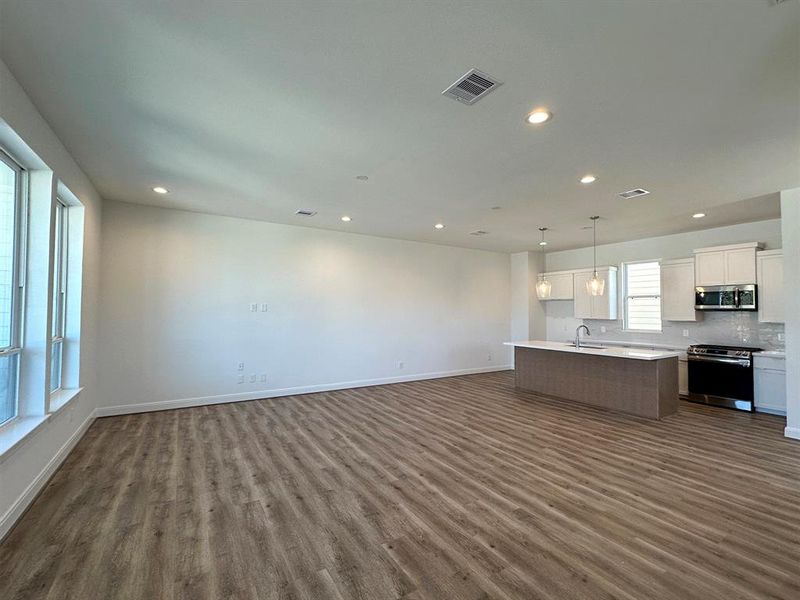 2nd Floor Living open to Dining/Kitchen.  *Finishes will be per Erin Park spec packages. *