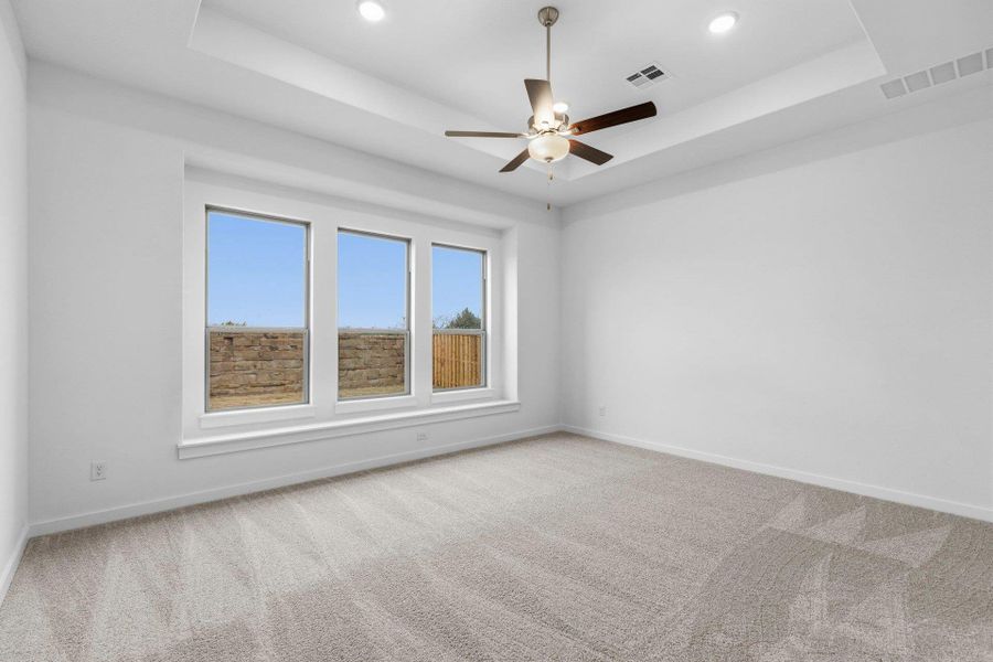 Primary Bedroom with tray ceiling