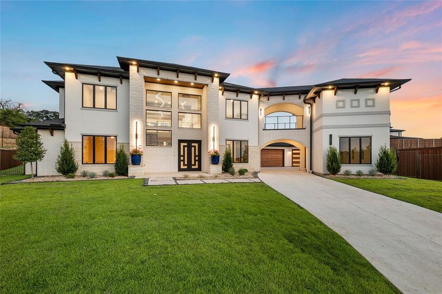 Front exterior of a new home in , Aledo, TX, highlighting curb appeal (Image 1). Front exterior of a new home in , Aledo, TX, highlighting curb appeal (Image 1).
