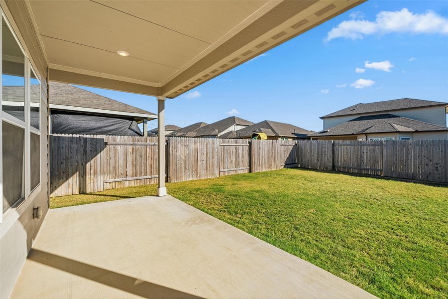 Exterior details and patio area of a home in Butler Farms - Reserve Collection, Liberty Hill (Image 4).
