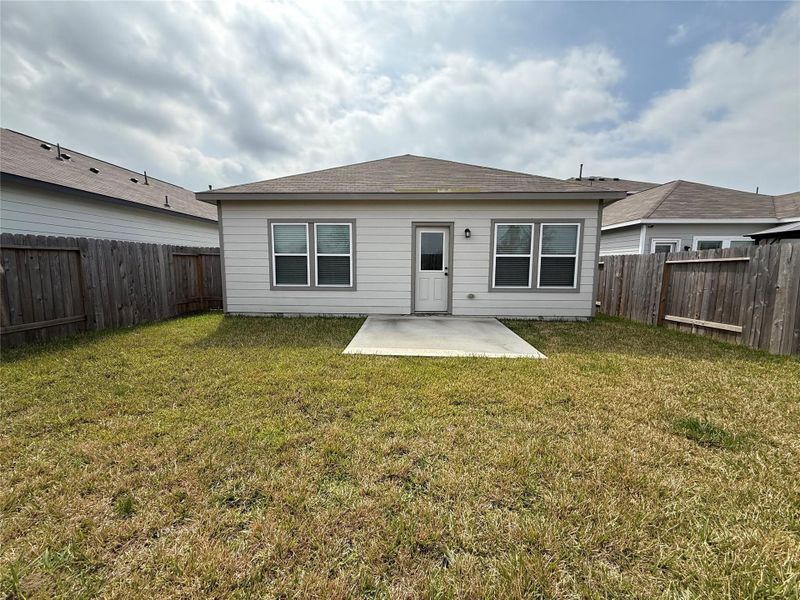 Exterior details and patio area of a home in Barrett Crossing, Crosby (Image 3).