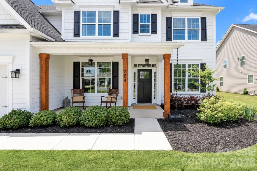 Exterior details and patio area of a home in Falls Cove, Troutman (Image 28).