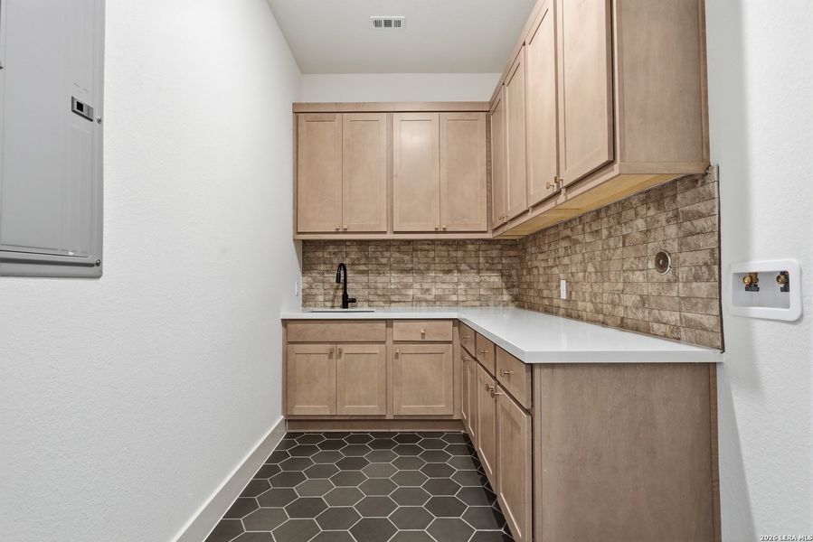 Furnished interior view inside a new home in Enchanted Bluff, San Antonio (Image 17).