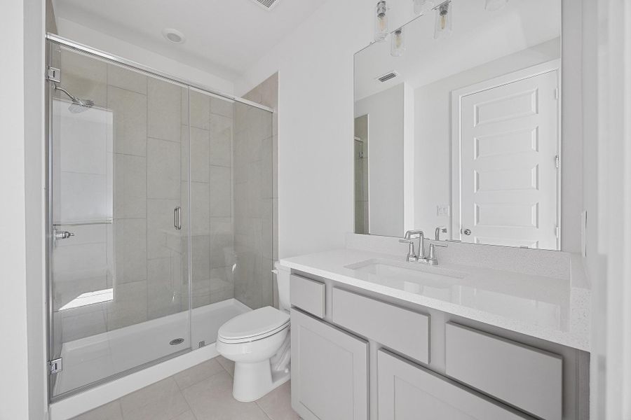 Furnished interior view inside a new home in Flora - 60', Hutto (Image 11).