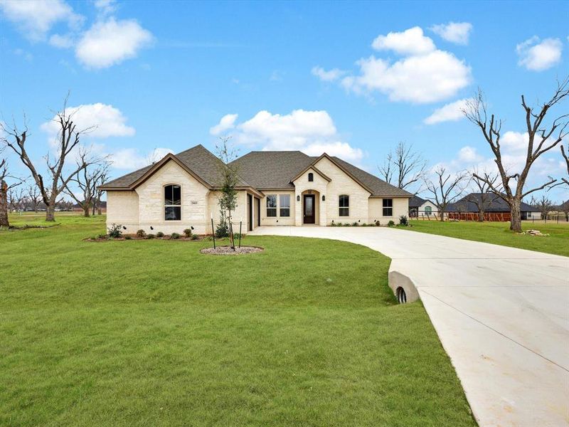 Front exterior of a new home in , Granbury, TX, highlighting curb appeal (Image 24).
