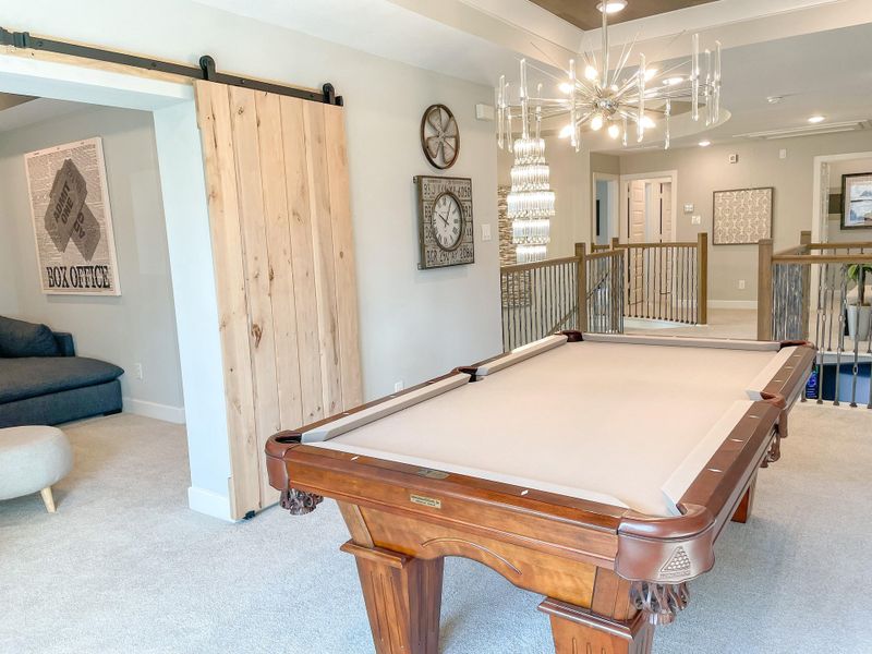 Furnished interior view inside a new home in Bridgeland, Cypress (Image 28).