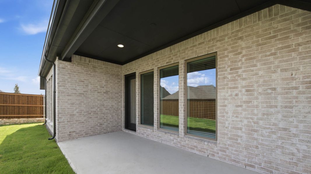Exterior details and patio area of a home in Walsh, Fort Worth (Image 4). Exterior details and patio area of a home in Walsh, Fort Worth (Image 4).