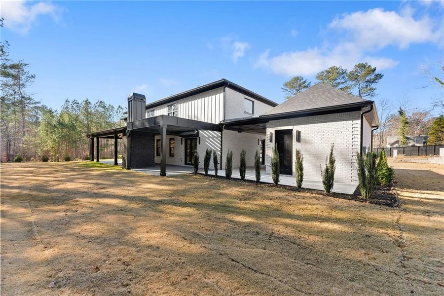 Exterior details and patio area of a home in , Hoschton (Image 44).