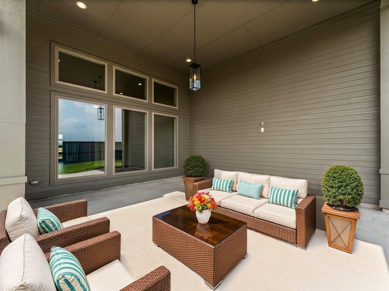 Exterior details and patio area of a home in Fulshear Lakes Gardens, Fulshear (Image 3).