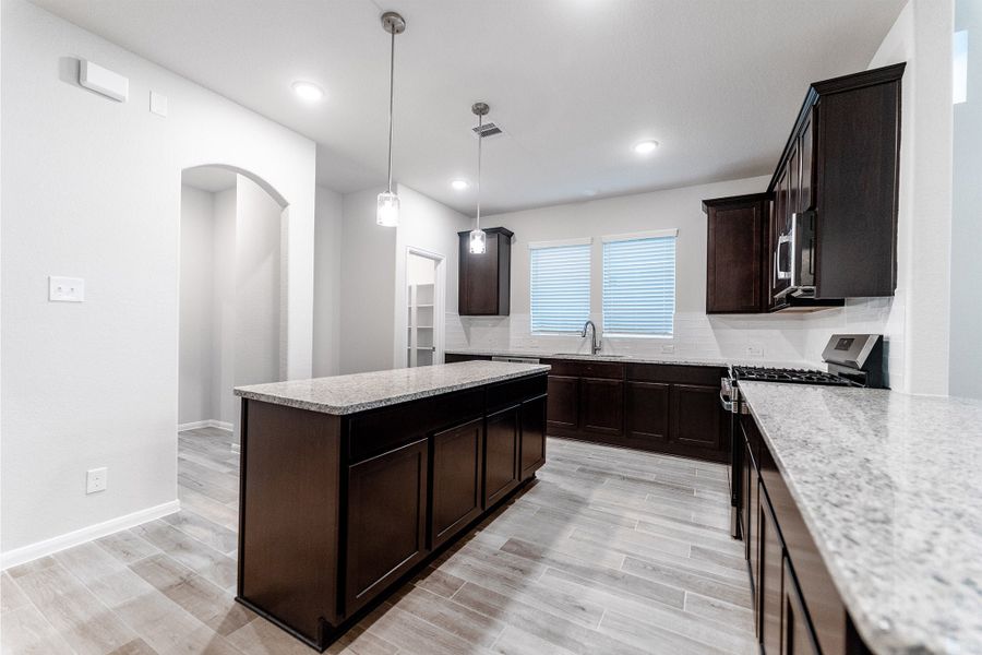 Furnished interior view inside a new home in Creekhaven, Iowa Colony (Image 5).