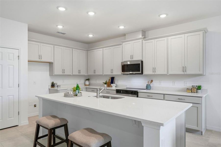 Furnished interior view inside a new home in Trinity Place, St. Cloud (Image 11).