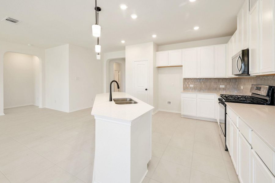 Furnished interior view inside a new home in River Bluff, Leander (Image 9).