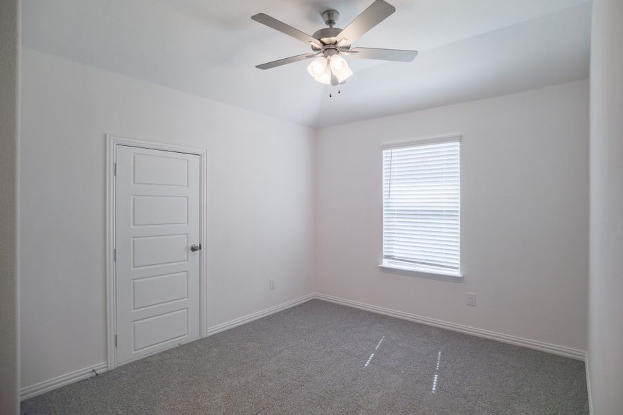 Spacious, unfurnished interior of a new home in The Villages of Hurricane Creek, Anna (Image 26).