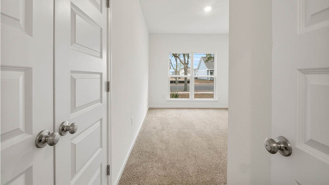 Representative unfurnished interior of a home built from the Mason by D.R. Horton in Owl's Head East, Freeport (Image 26). Representative unfurnished interior of a home built from the Mason by D.R. Horton in Owl's Head East, Freeport (Image 26).