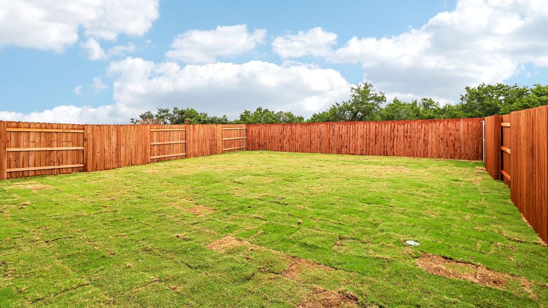 Exterior details and patio area of a home in Bar W Ranch, Leander (Image 19).