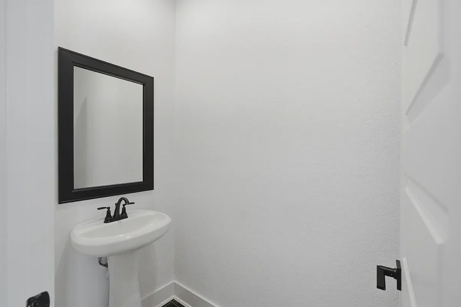 Representative furnished interior of a home built from the Kingston by Chesmar Homes in Prominence 60's, San Antonio (Image 6).