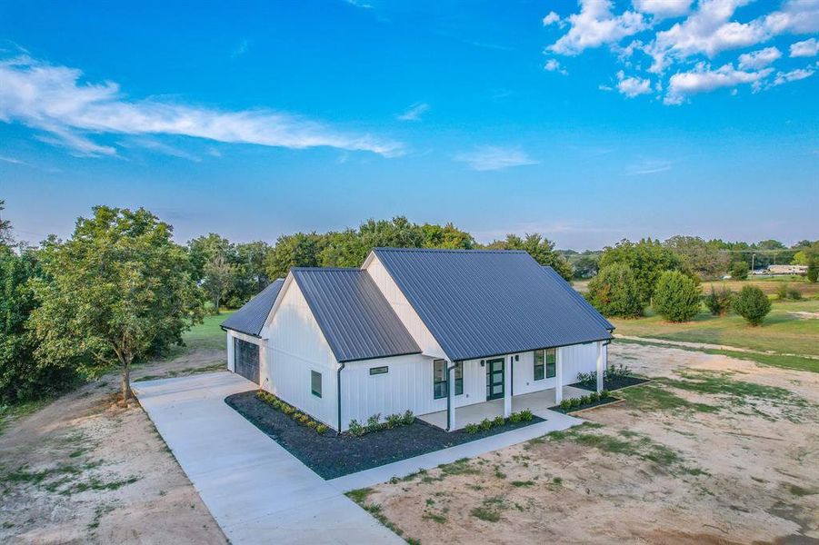 Front exterior of a new home in , Malakoff, TX, highlighting curb appeal (Image 22). Front exterior of a new home in , Malakoff, TX, highlighting curb appeal (Image 22).