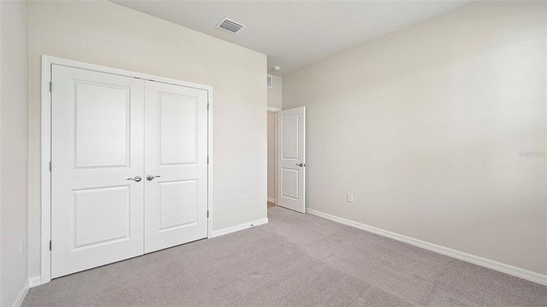 Spacious, unfurnished interior of a new home in Legacy Preserve, Parrish (Image 18). Spacious, unfurnished interior of a new home in Legacy Preserve, Parrish (Image 18).