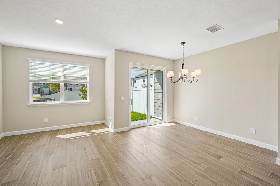 Dining space is well connected to the family room space