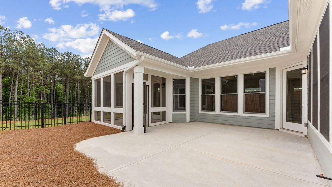 Exterior details and patio area of a home in The Courtyards at Bailey Farms, Dacula (Image 3).