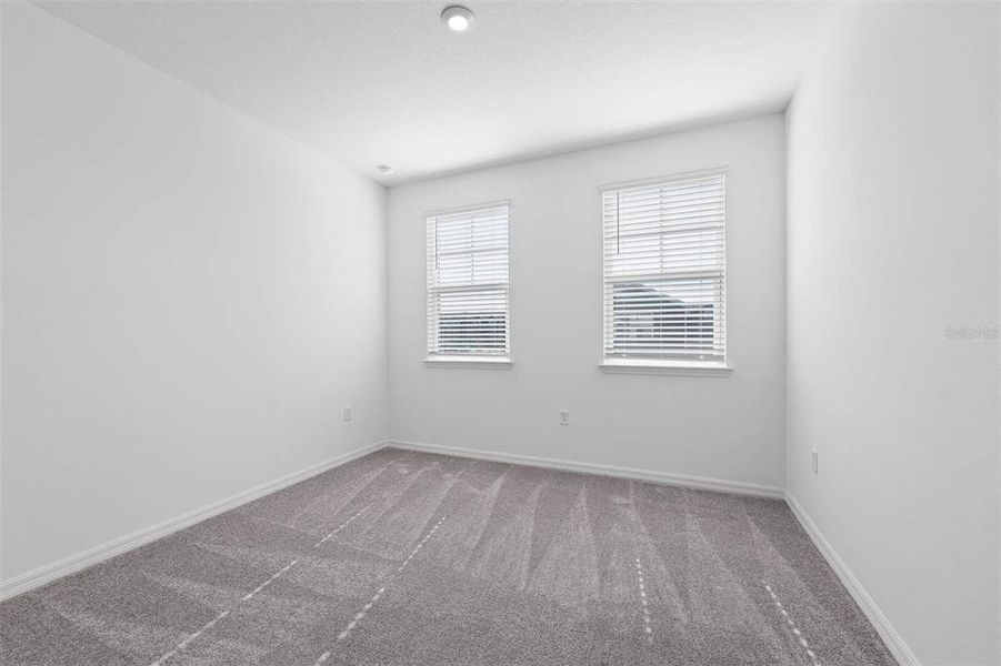 Spacious, unfurnished interior of a new home in Brack Ranch, St. Cloud (Image 36).