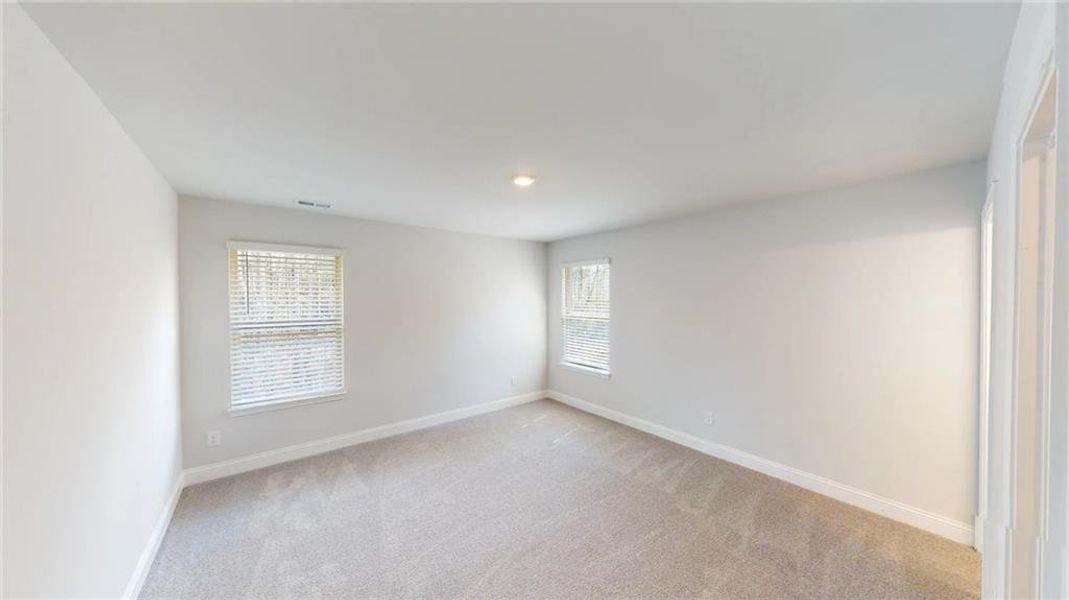 Spacious, unfurnished interior of a new home in Mirror Lake at South Harbour, Villa Rica (Image 23).