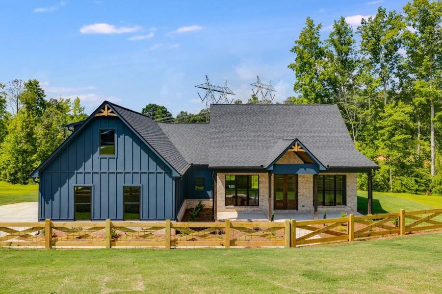 Front exterior of a new home in , Dallas, GA, highlighting curb appeal (Image 19).