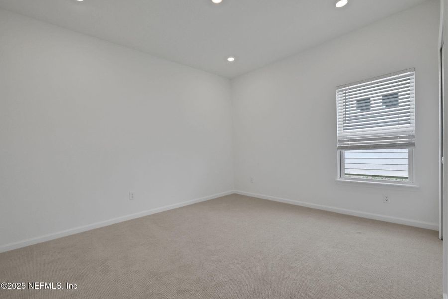 Spacious, unfurnished interior of a new home in Brook Forest, St. Augustine (Image 32).
