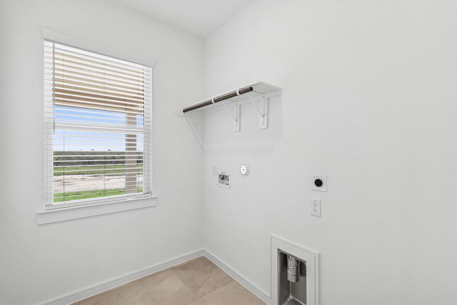 Laundry room (*Photo not of actual home and used for illustration purposes only.)