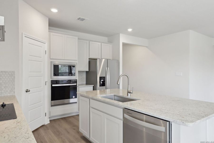 Furnished interior view inside a new home in Legendary Trails - Classic Series, Cibolo (Image 11).