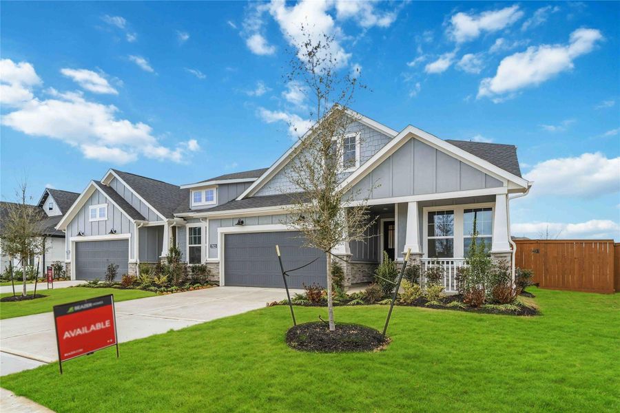 Front exterior of a new home in Elyson, Katy, TX, highlighting curb appeal (Image 2).