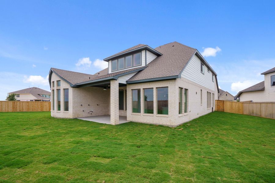 Exterior details and patio area of a home in Bridgeland, Cypress (Image 4).