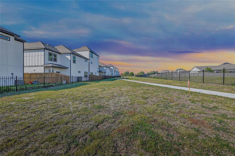 Exterior details and patio area of a home in Metro Village, Houston (Image 28).
